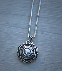 Swirling Charm Necklace