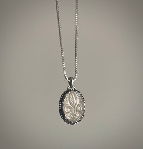 Carved White Moonstone Pendant